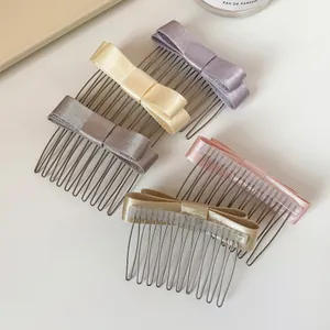 Set di pettini per capelli con fiocco in raso in cinque eleganti colori pastello