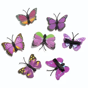 Detail view of seven colorful butterfly hair clips with durable metal alligator clips