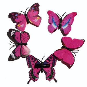 Detail view of 5-piece pink butterfly hair clip set with metal alligator clips