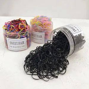 Élastiques à cheveux en boîte transparente aux tons noirs et couleurs pastel macaron