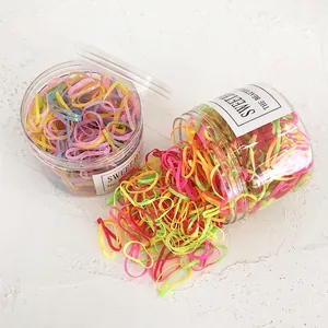 Pot d'élastiques à cheveux sans couture colorés aux tons bonbon et haute élasticité