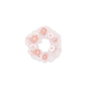 Pink and white organza scrunchie with sweet floral embroidery on white background