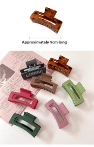 Detail showing 9cm large rectangular hollow hair clips in multiple colors with non-slip teeth