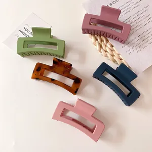 Set of five matte rectangle geometric hair clips in various muted pastel colors