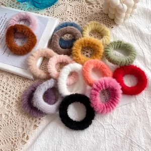 Colorful plush faux rabbit fur hair scrunchies set in various autumn winter shades