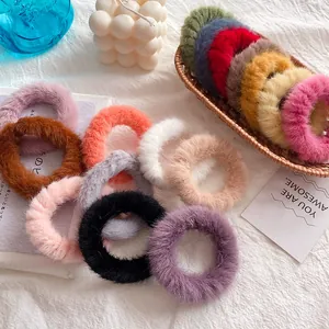 Plush faux rabbit fur scrunchies in various candy colors for elegant women's hairstyles