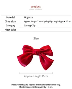 Details der 21 cm roten Organza-Haarschleife mit einem 10 cm langen Federclip-Verschluss