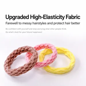 Set di tre elastici per capelli dai colori caramella in marrone, rosa e giallo