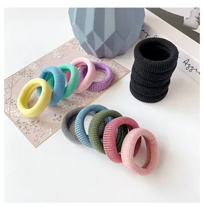 Detail of multi-color seamless elastic hair ties with high-stretch woven texture
