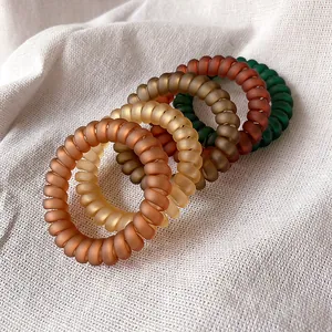 5-piece matte earth tone spiral telephone wire hair ties for durable ponytail hold