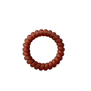 Brown matte spiral telephone wire hair tie with durable elastic design for women