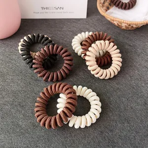 Élastiques à cheveux spirale multicolores tons terre pour coiffure sans traces