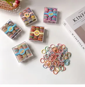 Macro de 100 gomas elásticas de colores para el pelo de niños en caja de regalo