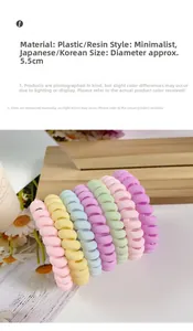 Macro shot of 5.5cm spiral telephone wire hair ties in various macaron candy colors