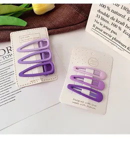 Set of matte purple gradient teardrop snap hair clips on white card holder display