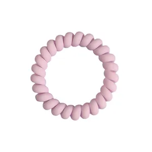 Matte candy-colored spiral telephone wire hair tie in light pastel pink purple