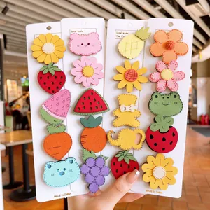 Close-up of 20pcs felt cartoon hair clips for girls with fruit and animal shapes
