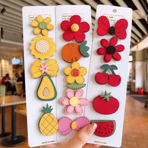 Set of 15 cute cartoon fruit and floral hair clips for girls on display cards