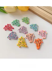 Detail of colorful star-shaped hair clips with polka dots for girls in candy colors