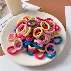 Colorful high-elastic seamless hair ties set for kids displayed in a white tray