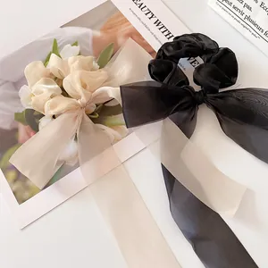 Elegant organza bow scrunchies with long ribbons in black and white colors