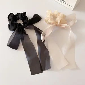 Elegant organza bow hair scrunchies with long ribbons in black and champagne colors