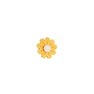 Cute yellow daisy velcro hair clip for kids featuring textured floral felt design