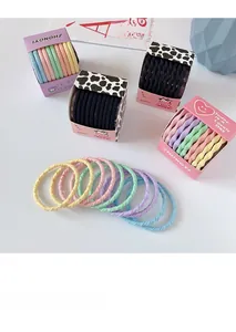 Détails d'élastiques spirales à haute élasticité en couleurs pastel et boîte cadeau