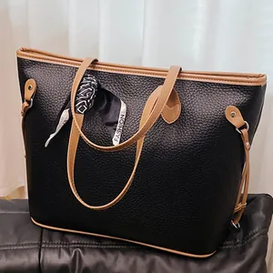 Chic black litchi grain tote bag with khaki trim and fashion silk scarf detail