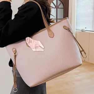 Pink purple textured leather tote bag with brown handles and a stylish silk scarf