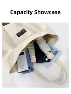 Grande borsa tote in tela con spazio interno per laptop, ombrello e smartphone
