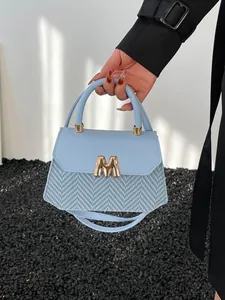 Vintage light blue leather baguette bag with woven texture and gold M buckle for women