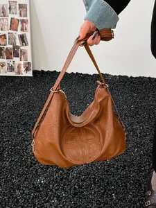 Vintage caramel brown faux leather large tote bag with embossed circular design