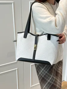 Contrast crocodile embossed leather tote bag with gold magnetic lock and top handles