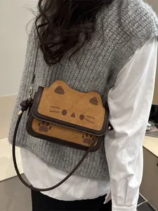 Cute cartoon cat shaped crossbody bag for women in yellow suede with leather straps