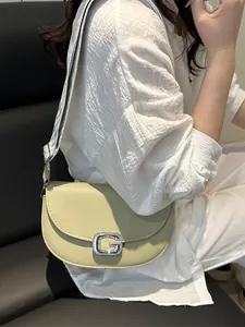 Chic light green saddle bag with sparkling rhinestone G-buckle and wide jacquard strap