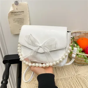 Sac à main carré blanc élégant avec poignée en perles et nœud pour femmes