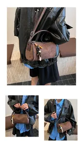 Detailed views of a vintage brown matte cylinder bag with bohemian beaded tassel charm