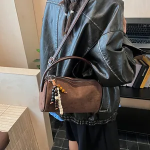 Brown frosted retro boston bag with wooden bead tassels and crossbody strap