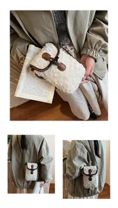 Detail of plush crossbody bag with cream wool fabric and brown leather contrast trim