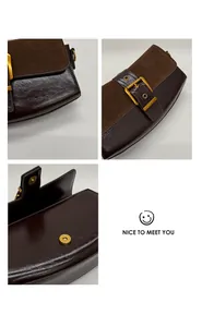 Detail of dark brown leather shoulder bag with vintage gold buckle and magnetic flap