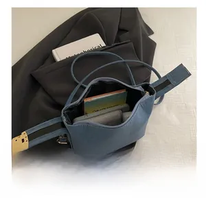 Detail shot of the large blue tote bag interior showing spacious storage for daily essentials