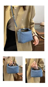 Detail view of large blue leopard print tote bag with adjustable shoulder strap