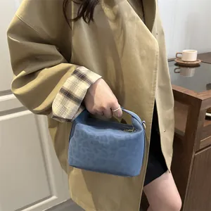 Large capacity light blue leopard print tote bag with top handle and metal zipper