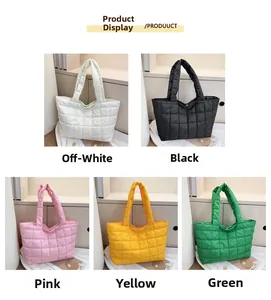 Quilted puffer tote bags displayed in five colors showing shiny nylon material and padding
