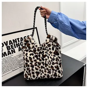 Leopard print plush tote bag for women with woven handles in a minimalist chic style