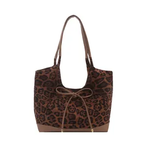Fashionable large leopard print tote bag with brown straps and bow tie decoration