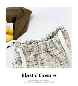 Detail of tweed shoulder bag featuring an elastic closure and woven golden metallic threads