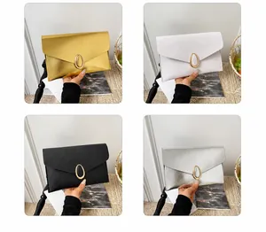 Collage of four envelope clutch bags in gold, white, black, and silver with metal buckles