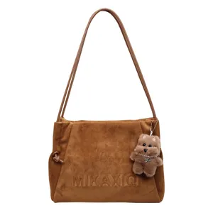 Vintage matte brown tote bag for women with plush bear charm and large capacity